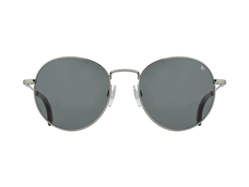 Front view of gunmetal American Optical AO-1002 round sunglasses with non-polarised grey nylon lens