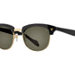 Front angle view of black and gold American Optical Sirmont metal sunglasses with non-polarised green nylon lens