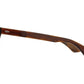 Side view of woodgrain American Optical Tournament acetate sunglasses with polarised green nylon lens