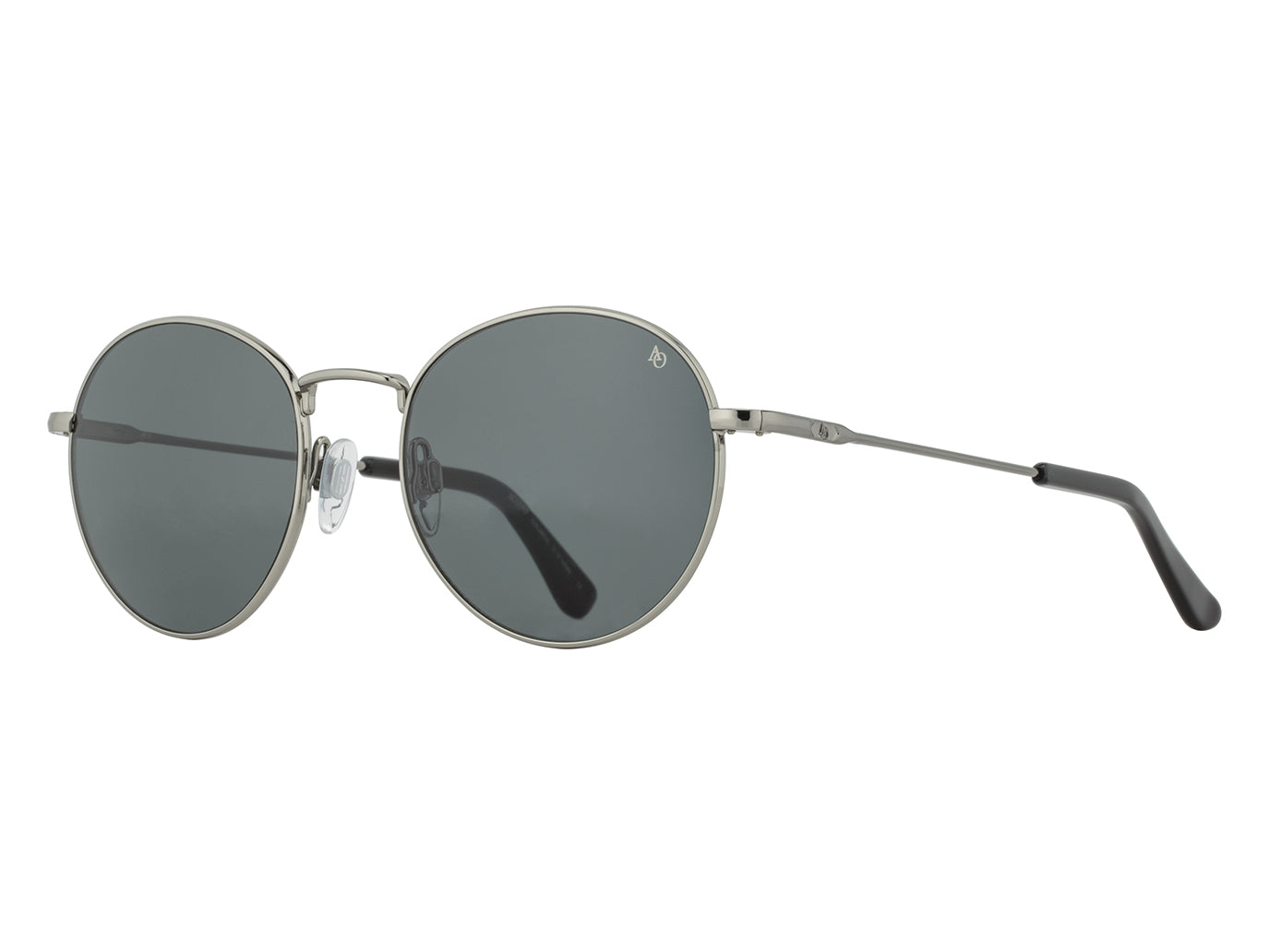 Front angle view of gunmetal American Optical AO-1002 round sunglasses with non-polarised grey nylon lens