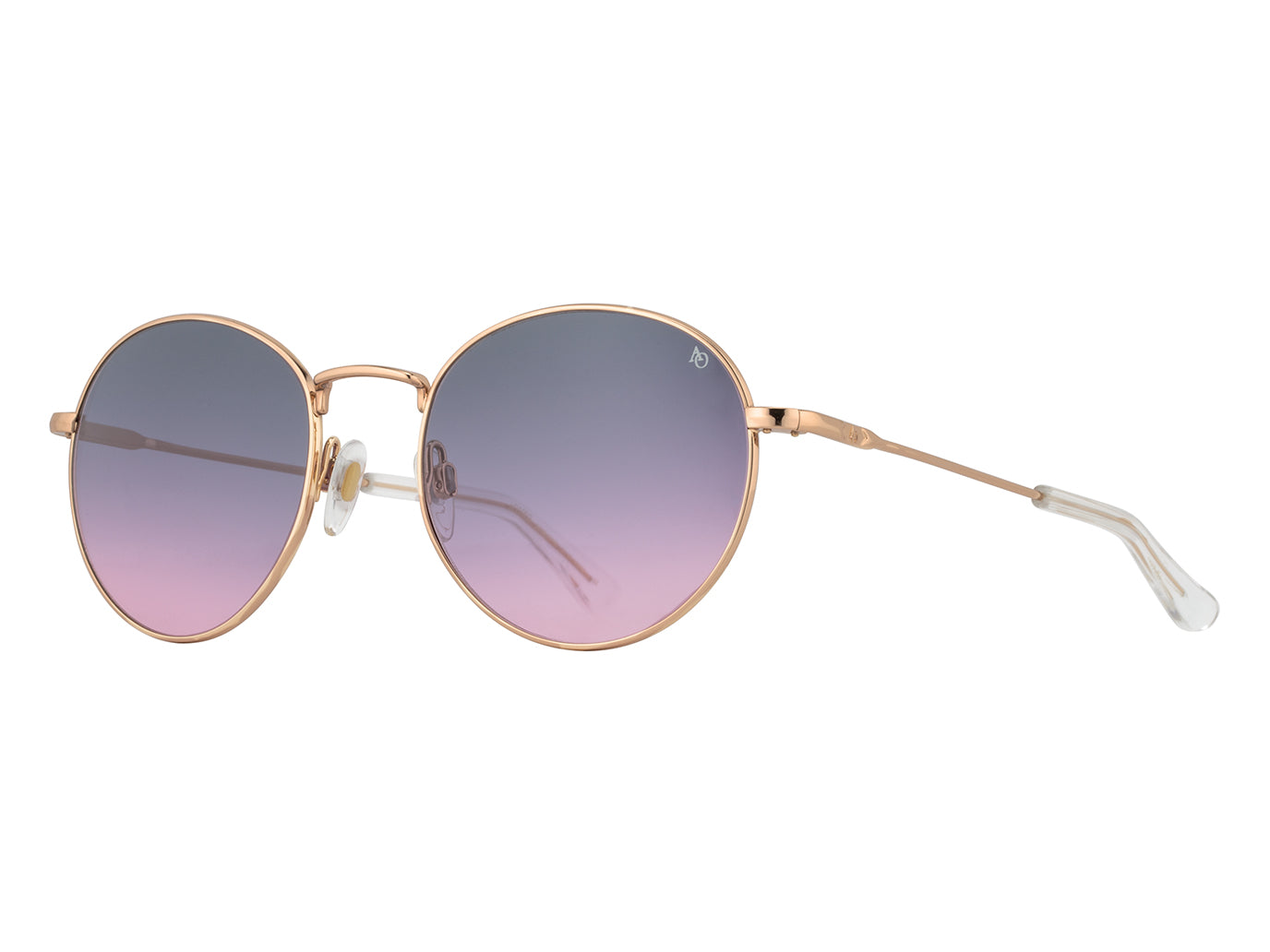 Front angle view of rose gold American Optical AO-1002 round sunglasses with non-polarised pink gradient nylon lens