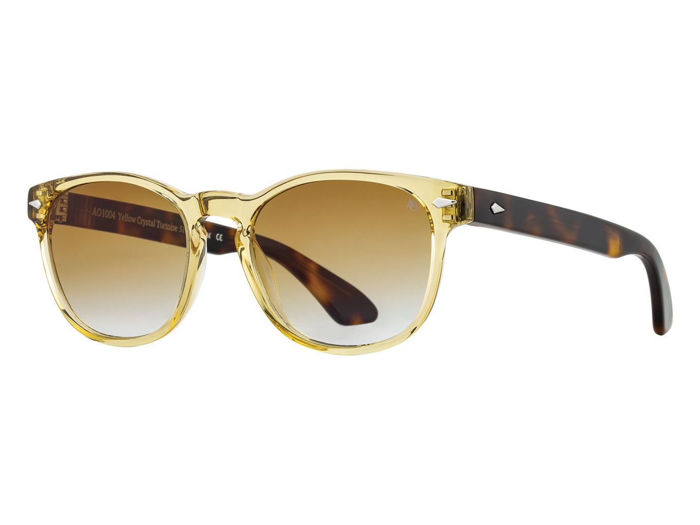 Front angle view of yellow crystal and tortoise American Optical AO-1004 acetate sunglasses with non-polarised brown gradient nylon lens