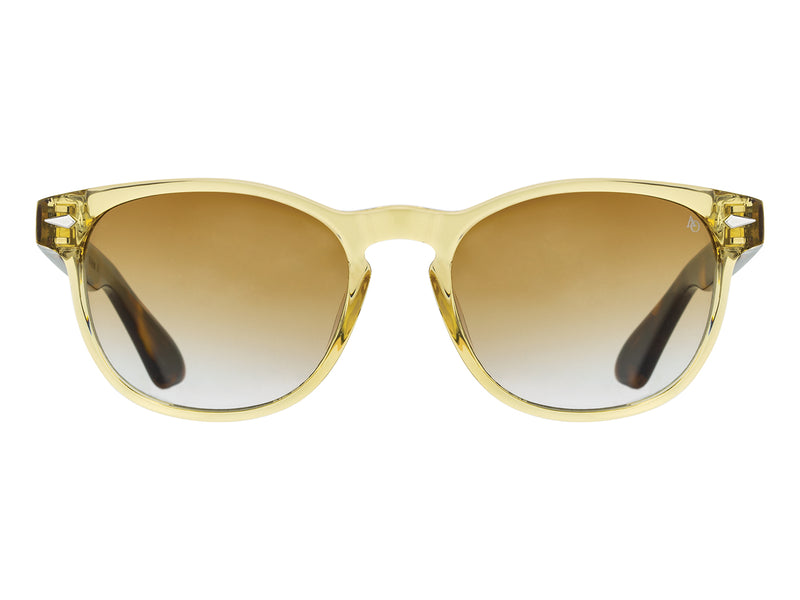 Front view of yellow crystal and tortoise American Optical AO-1004 acetate sunglasses with non-polarised brown gradient nylon lens